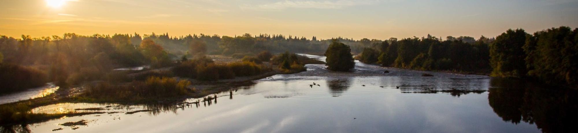 Sunset on the River by Jamieson Scott